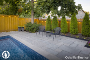 Oakville Blue Ice - Picture of a patio with Oakville Blue Ice paving pattern 1 and bullnose coping around pool